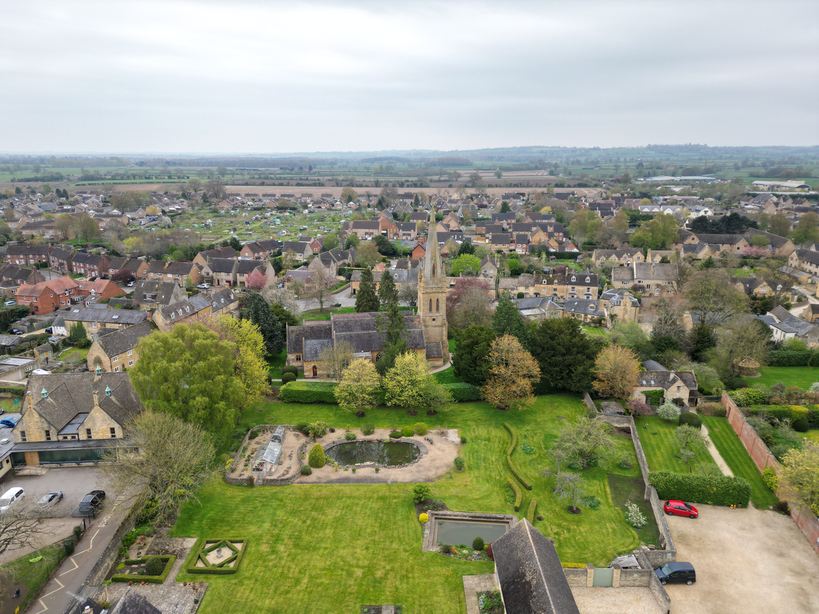 Places to Staycation in the Cotswolds St Davids church Moreton-in-Marsh Cotswold market town UK drone , aerial
